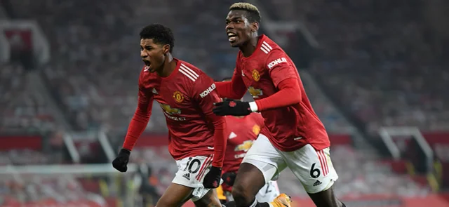 Marcus Rashford y Paul Pogba celebran el gol de la victoria de Manchester United / AFP