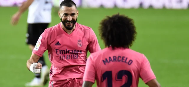 Benzema celebra con Marcelo un gol en LaLiga / Foto AFP