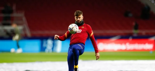 Piqué en calentamiento con Barcelona / Foto AFP