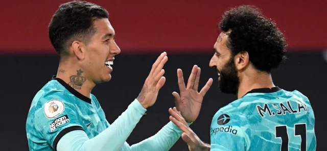 Firmino y Salah se reportaron con gol / AFP