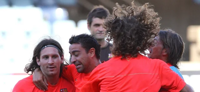Puyol, Messi y Xavi en sus inicios con Barcelona / Foto AFP