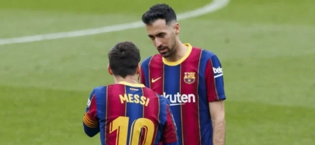 Busquets y Messi en Barcelona/ AFP