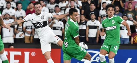 Nacional busca la remontada frente a Olimpia / AFP