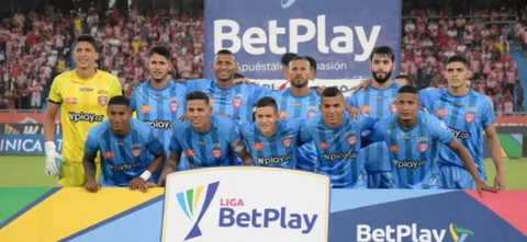 Atajada de Ramírez contra Junior. / Foto: Vizzorimage.