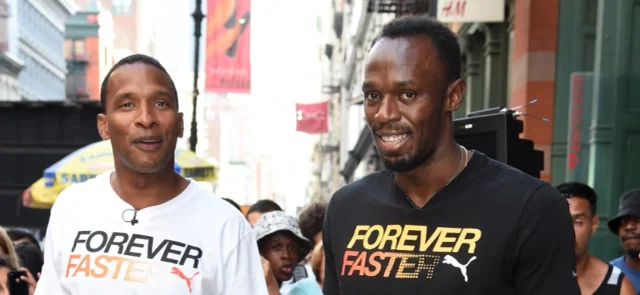 Shaka Hislop y Usain Bolt - Foto: AFP