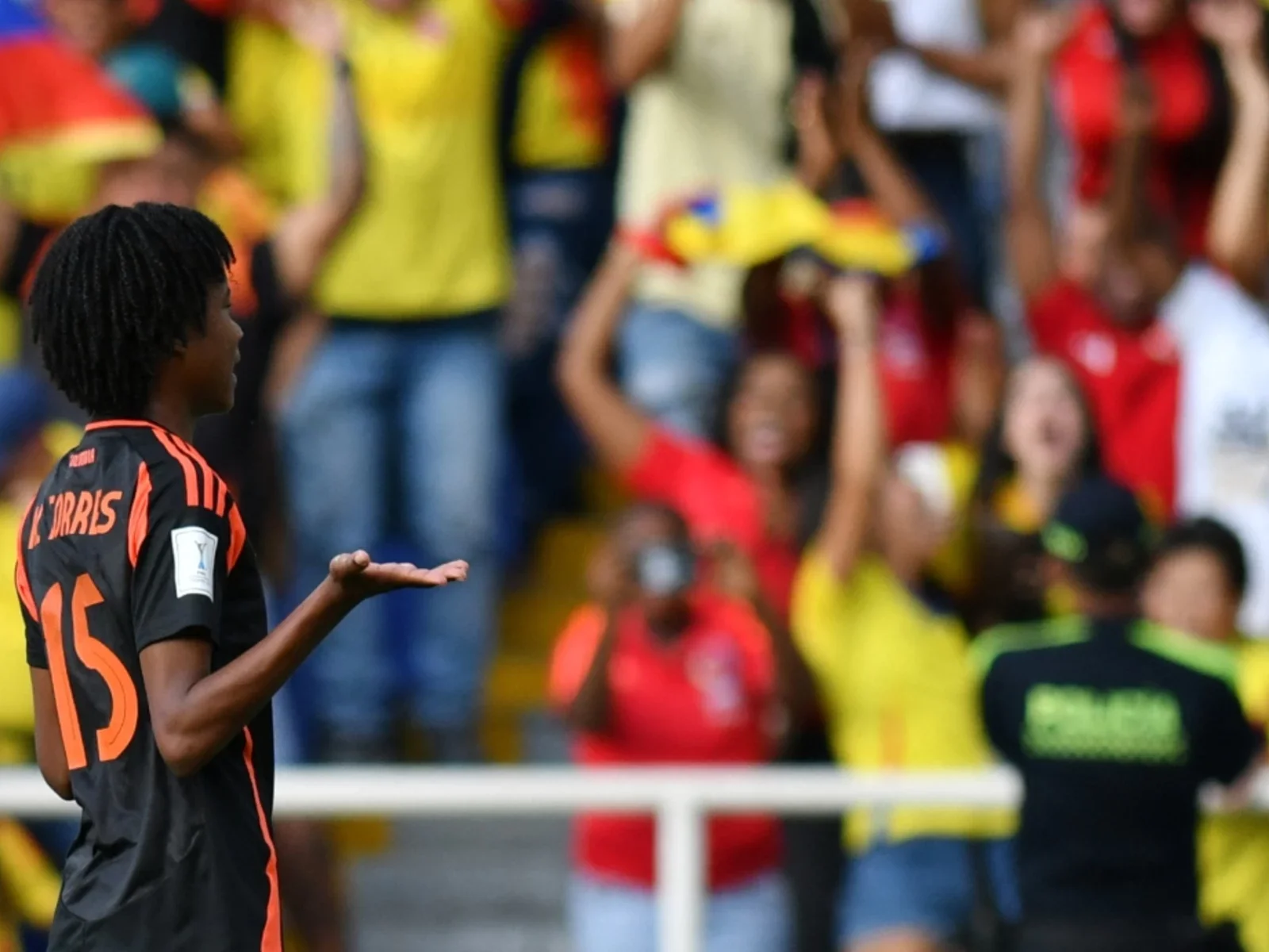 Karla Torres celebrando una anotación en los cuartos de final / AFP