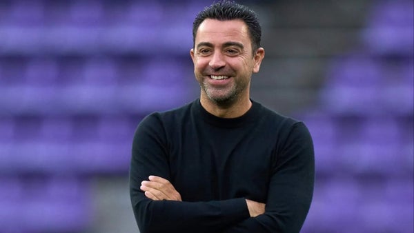 Xavi Hernández posó con camiseta de campeón del FPC