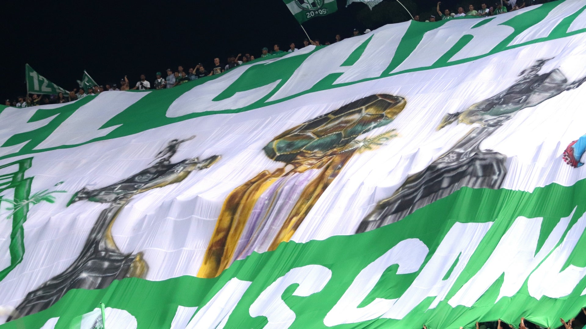 Tifo de hinchas de Atlético Nacional con trofeos - VizzorImage