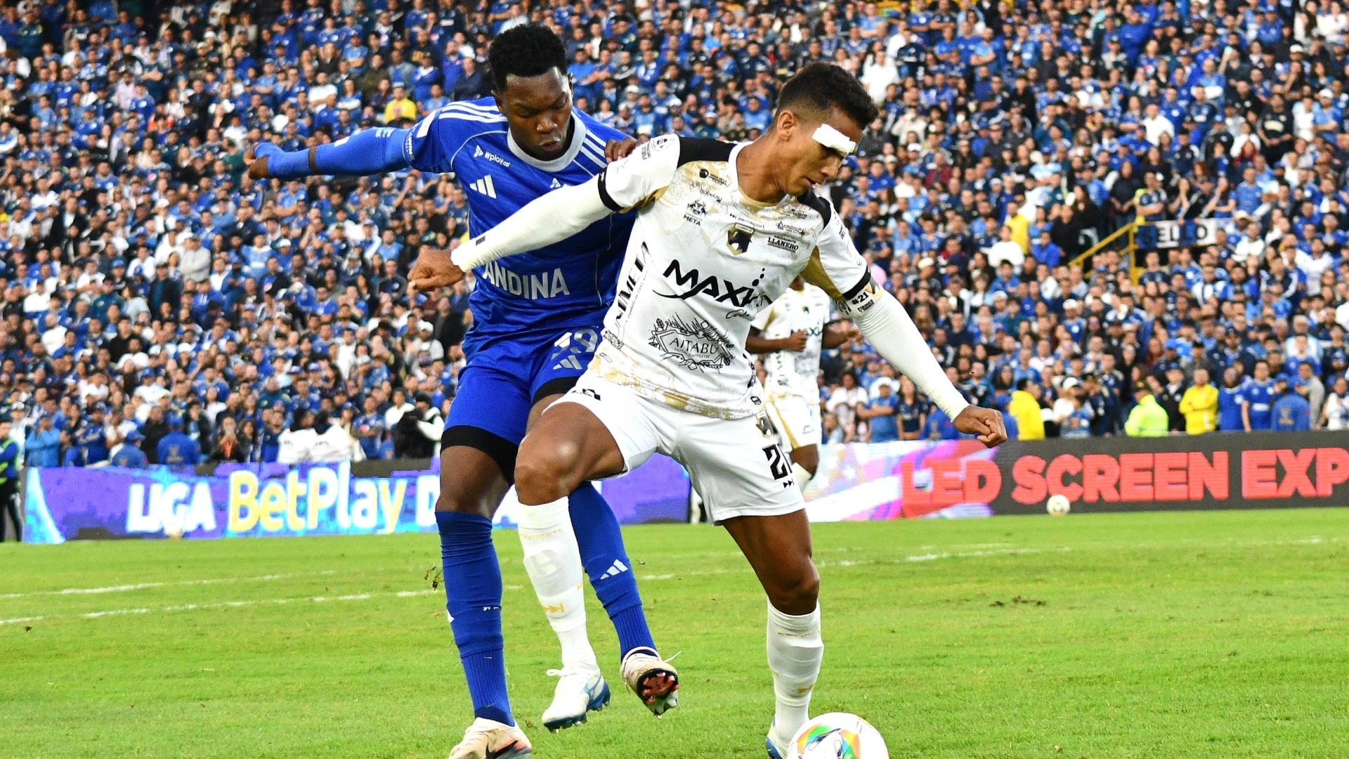 Llaneros pidió penalti por mano vs. Millonarios - VizzorImage